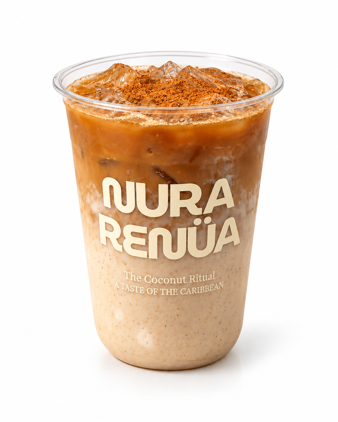 Layered iced coconut latte in a clear cup labeled Nura Renua topped with cinnamon, photographed on a warm neutral surface with soft palm leaf shadows